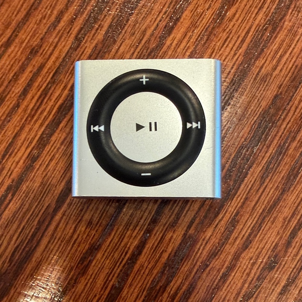 Silver and Black Clip-On Music Player